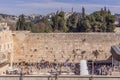 The Western Wall (Wailing Wall), with the pilgrims praying, the Israeli flag in Jerusalem, Israel. Royalty Free Stock Photo