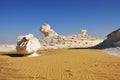 Western White desert at sunset, Sahara. Egypt Royalty Free Stock Photo