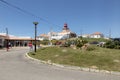 The westernmost lighthouse of Cabo da Roca in Porugalia with the yellow-flowered Hottentot fig growing