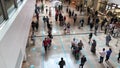 Westfield Shopping Centre, a long line of people queuing to enter a store.