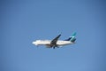 Westjet Airplane in Flight Royalty Free Stock Photo