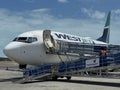 WestJet Airplane at Providenciales Airport in the Turks and Caicos Islands Royalty Free Stock Photo