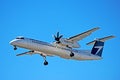 WestJet Encore Bombardier Dash 8 Q400 On Final Approach Royalty Free Stock Photo