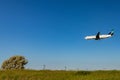 WestJet passenger jet just above the fields near Pearson International Airport, Toronto