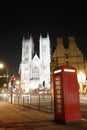 Westminster Abbey and Telephone Booth at Night Royalty Free Stock Photo