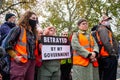WESTMINSTER, LONDON, ENGLAND- 20 November 2021: Protesters during a demonstration in support of Insulate Britain