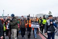 WESTMINSTER, LONDON, ENGLAND- 20 November 2021: Protesters marching during a demonstration in support of Insulate Britain