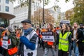 WESTMINSTER, LONDON, ENGLAND- 20 November 2021: Protesters marching during a demonstration in support of Insulate Britain