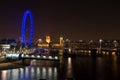 Westminster Palace and London Eye at night Royalty Free Stock Photo