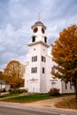 Vertical autumnal view of the historic wooden Old Parish Church in the quaint village of Weston
