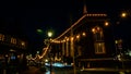 Church Ln in downtown area week before Christmas with Patagonia store building and holiday decoration near Post Road