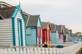 WESTWARD HO!, DEVON, ENGLAND - 21 June 2021: Beach huts in Westward Ho! in Devon, England Royalty Free Stock Photo