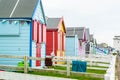 WESTWARD HO!, DEVON, ENGLAND - 21 June 2021: Beach huts in Westward Ho! in Devon, England Royalty Free Stock Photo