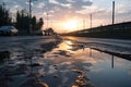 wet asphalt in the morning after dew has evaporated, with clouds and blue sky in the background