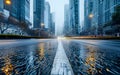 Wet asphalt road close-up. Wet street with blurred buildings in background. Royalty Free Stock Photo