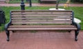 Wet bench in the rain in the autumn Park Royalty Free Stock Photo