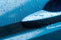 Wet blue car door handle detail water drops Royalty Free Stock Photo