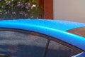 Wet blue car roof Royalty Free Stock Photo