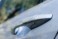 Wet car door Royalty Free Stock Photo