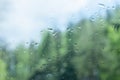 Wet car glass rain storm outside