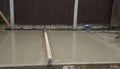 Wet cement shed base Royalty Free Stock Photo