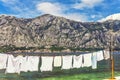 Wet clothes drying on the pier near the sea Royalty Free Stock Photo