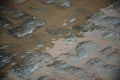 Wet cobblestones at night after rain on a street or road surface Royalty Free Stock Photo