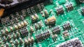 wet digital circuit board with microprocessors and components, closeup full-frame macro background Royalty Free Stock Photo