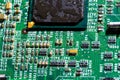 wet digital circuit board with microprocessors and components, closeup full-frame macro background Royalty Free Stock Photo