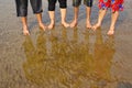 Wet feet on the sand, Nagaon beach Royalty Free Stock Photo