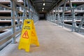 Wet floor sign on a corridor Royalty Free Stock Photo