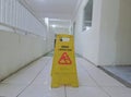 The wet floor sign is placed on the floor that has just been mopped