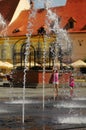 Wet girls in Sibiu plaza, Romania Royalty Free Stock Photo