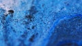 Wet glitter texture paint flow blue black ink wave