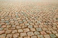 Wet gravel on the ground. Wet road of stones. Natural background. Natural paving granite on road