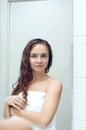 Wet hair woman portrait, beauty hair healthy skin care concept, beautiful model with wet hair in bathroom Royalty Free Stock Photo