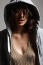 wet hair young woman in hood. sexy girl in grey hoodie Royalty Free Stock Photo