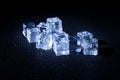 Wet ice cubes on black background Royalty Free Stock Photo