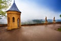 Wet inner yard of Hohenzollern castle in haze Royalty Free Stock Photo