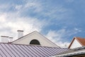 Wet metal roofs of city houses after rain Royalty Free Stock Photo