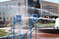 A wet, powerful stream of water splashes and shoots at the target, with a lot of pressure on the street at the attraction Royalty Free Stock Photo