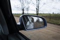 Wet by the rain the car mirror. Royalty Free Stock Photo