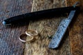 Wet razor on a wooden table Royalty Free Stock Photo