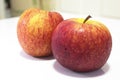 Wet red apple isolated on white