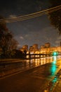 wet road surface in Moscow city on rainy night Royalty Free Stock Photo
