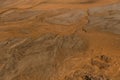 Minimalism background. Wet sand and beautiful streaks from the water top view. Natural sand looks as if someone turned over and Royalty Free Stock Photo