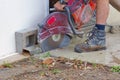 A man working with a wet saw Royalty Free Stock Photo