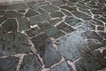 Wet shiny gray tiled mosaic pavement floor Royalty Free Stock Photo