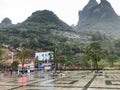 Wet square and view of mountains in XingPing town Royalty Free Stock Photo