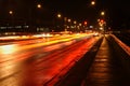 Wet street and abstract light trail